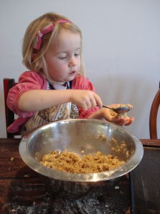 Ava rolls Anzac biscuits