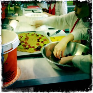 Placing the grapes just so...