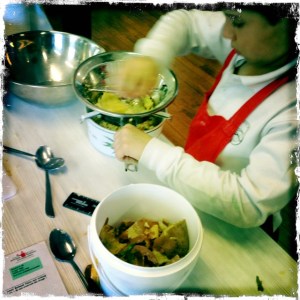 Passing potatoes through the mouli for gnocchi